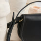 Mini-sac bandoulière en cuir Tyria